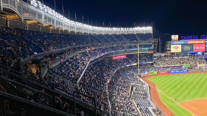 A picture of Yankee Stadium during a game between the Yankees and Pirates.