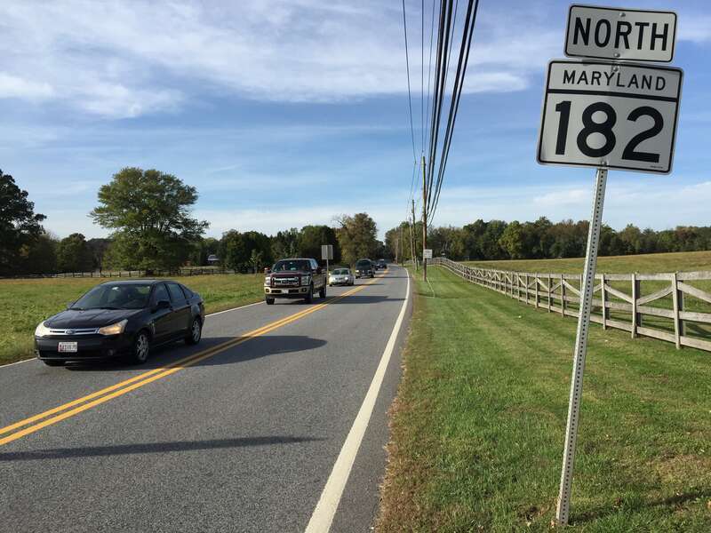 View north along Maryland State Route 182 (Norwood Road) just north of Ednor Road in Sandy Spring, Montgomery County, Maryland