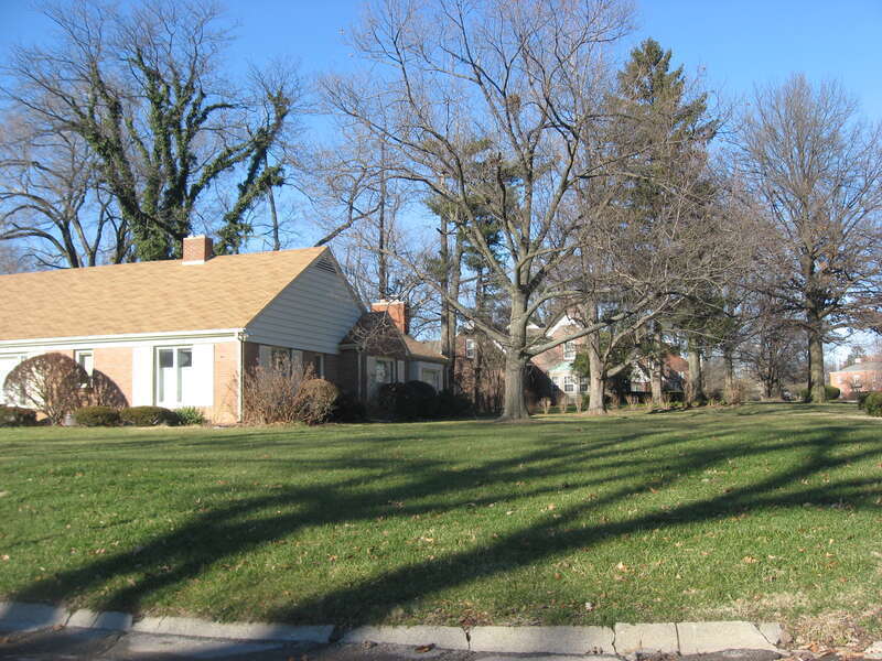 Houses on the western side of Warwick Road immediately north of the Berwyn Road intersection in Muncie, Indiana, United States.  They are a part of the Westwood Historic District, a historic district that is listed on the National Register of