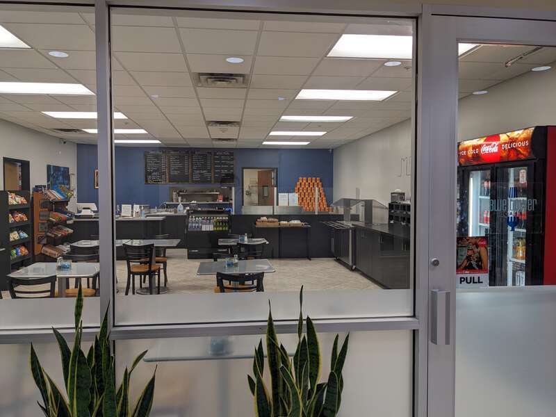 Blue Tower Cafe Layout. Includes burgers, sandwiches, chips, cooled drinks, and seating.