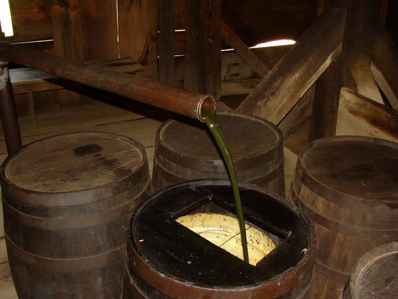 Recirculating petroleum is pumped from the well by a replica steam engine. The petroleum is originally from McClintock Well #1, the oldest continously producing oil well.



This is an image of a place or building that is listed on the National