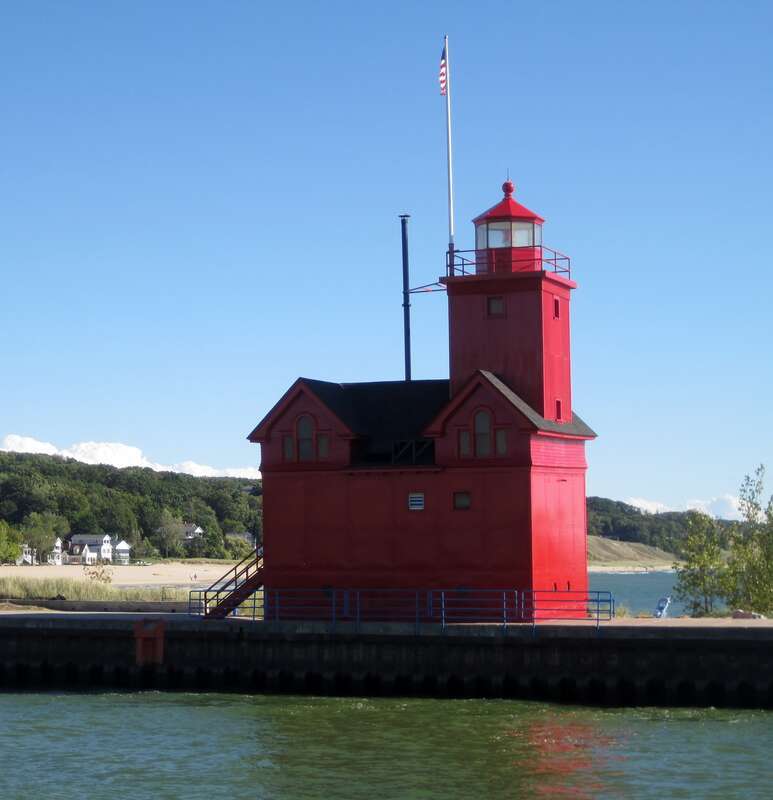The Holland Harbor Lighthouse in Holland, MI (1907). Residents of Holland long realized that Lake Macatawa would be an excellent harbor, but it wasn't until the 1850s that the residents personally dug the channel between the lake and Lake Michigan