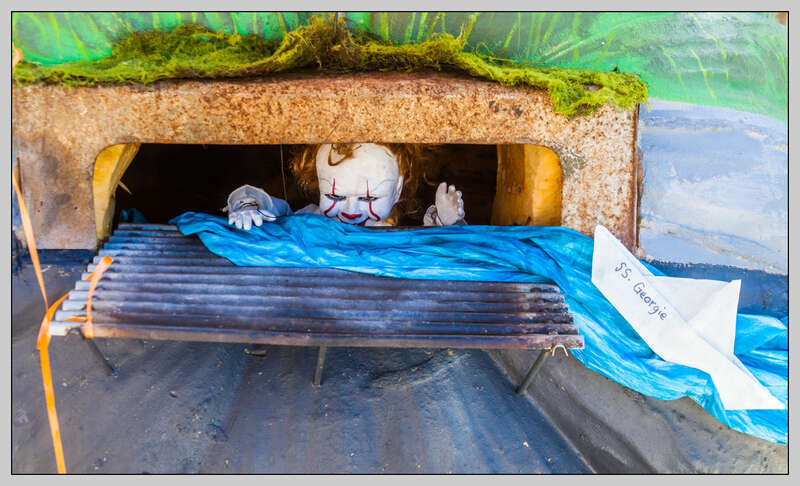 One of the carved pumkins at the Damariscotta Pumpkin Festival.  If you have seen the new movie 'IT' then you recognize this from an early scene in which IT grabs a small boy named Georgie, who is following his paper boat, and pulls him into the