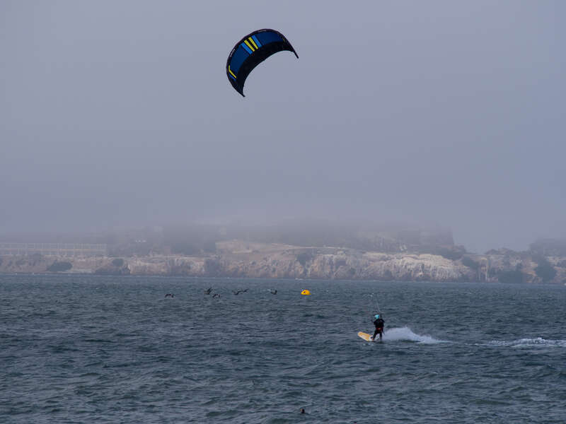 A kite surfer in San Francisco Bay near Crissy Field.