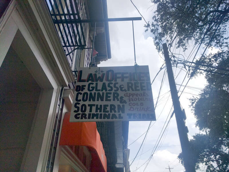 Hand lettered sign. Law office, criminal appeals and cold drinks, Garden District, New Orleans, Louisiana, USA