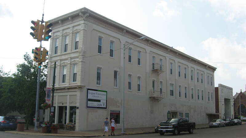 Eastern side and front of the McCarthy-Blosser-Dillon Building, located at 4 W. Main St. in Logan, Ohio, United States.  Built in 1883, it is listed on the National Register of Historic Places, and it is part of a Register-listed historic district,