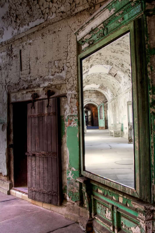 Eastern State Penitentiary was once the most famous and expensive prison in the world, but stands today in ruin, a haunting world of crumbling cellblocks and empty guard towers.
Known for its grand architecture and strict discipline, this was the