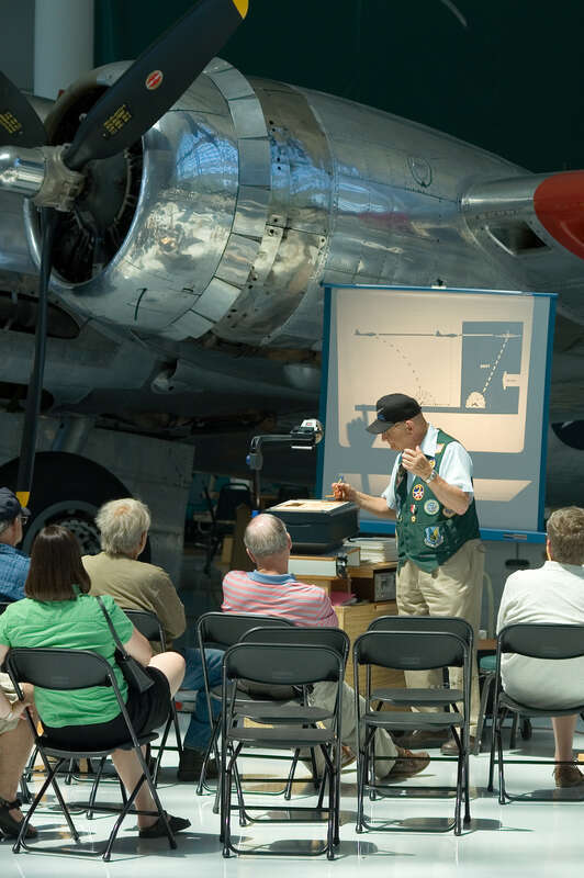 B-17 bomb sight instruction by a docent at the Evergreen Aviation Museum. McMinnville, Oregon. The volunteers at the museum are a wealth of historical knowledge.
