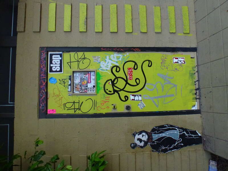 Open the page for this picture to access the series Opening a Door for You on Phoenix' Roosevelt Row, 2013