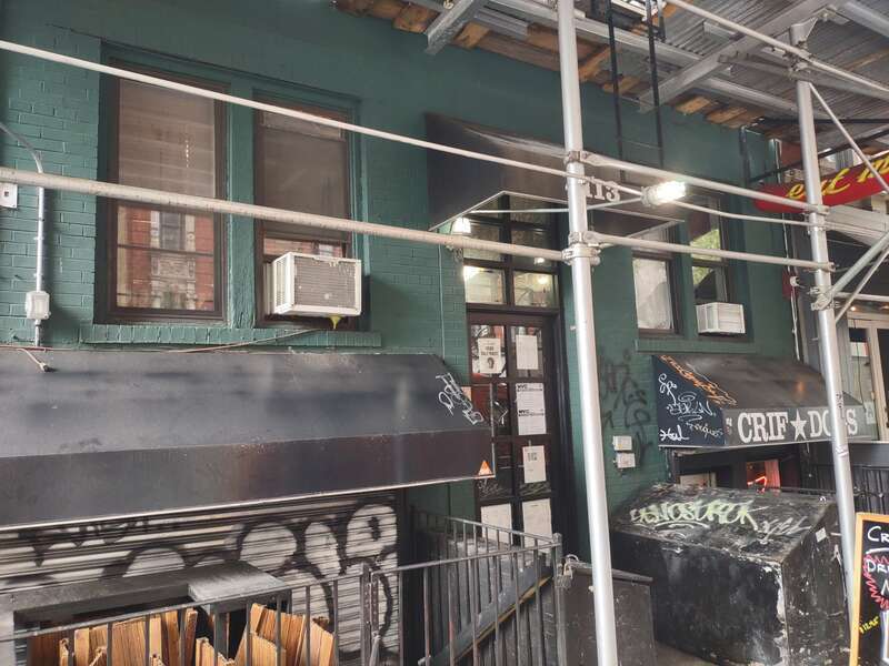 Looking east at a former bar on a sunny afternoon