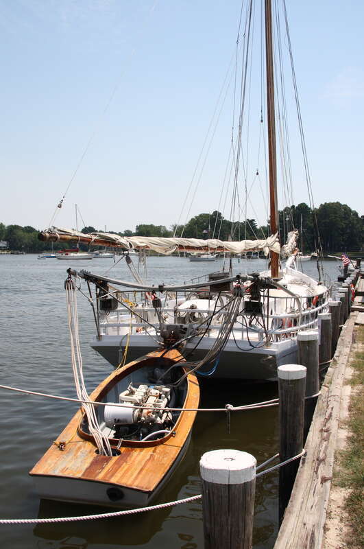 Chesapeake Bay skipjack H. M. Krentz and its pushboat at the Chesapeake Bay Maritime Museum, Saint Michaels, Maryland