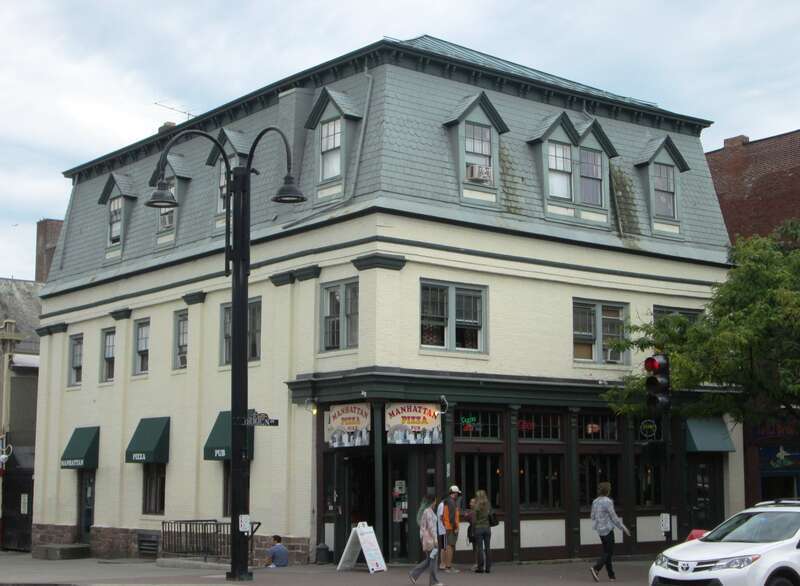 The building at 167 Main Street on the corner of College Street in Burlington, Vermont was originally built in the Greek Revival style in 1845 as a the first Baptist church in Burlington.  The Baptists moved in 1866 and the Burlington Times newspaper