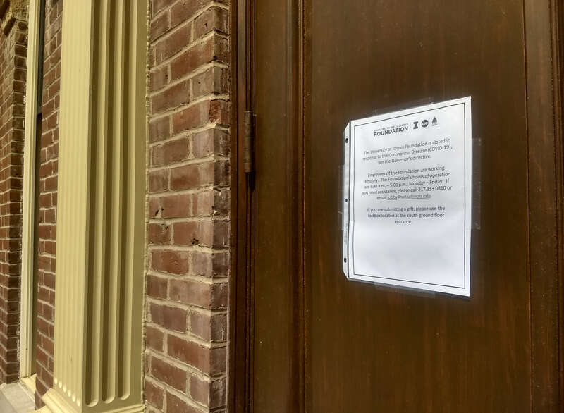 Signage from April 2020 posted outside Harker Hall at the University of Illinois at Urbana–Champaign. The sign states that the facility is closed because of the COVID-19 pandemic.