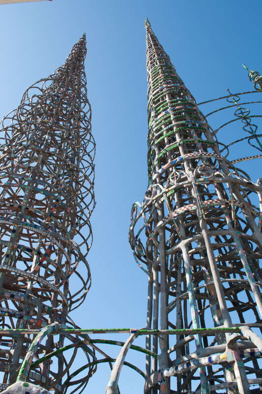 Watts Towers, California Historical Landmark No. 993, were built by Sabato Rodia, an Italian immigrant who lived in the area in the 1920s. He constructed this complex over a period of 33 years. Rodia, having suffered abuse from neighbors, abandoned