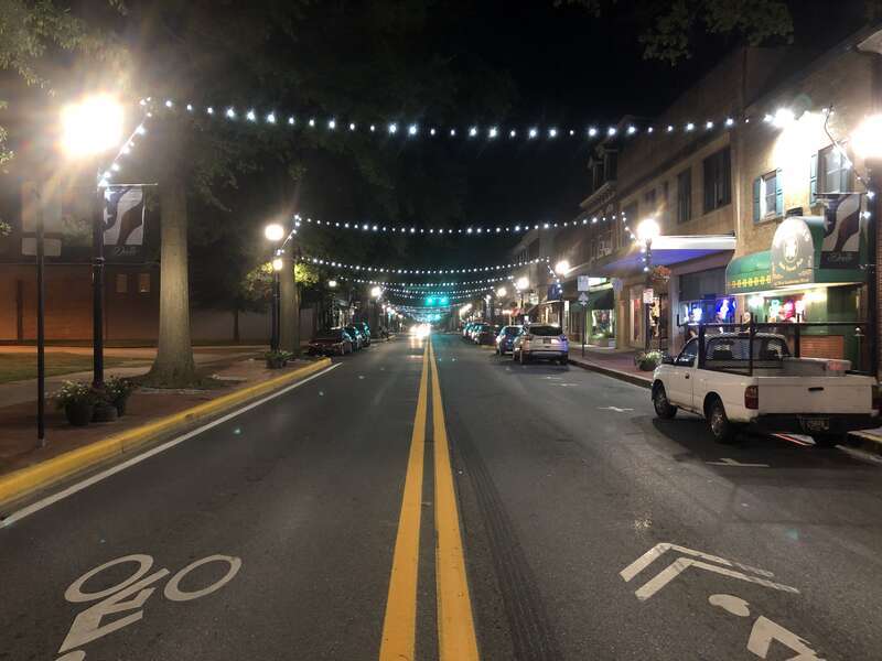 Night view westward along Loockerman Street at Bradford Street in Dover, Kent County, Delaware