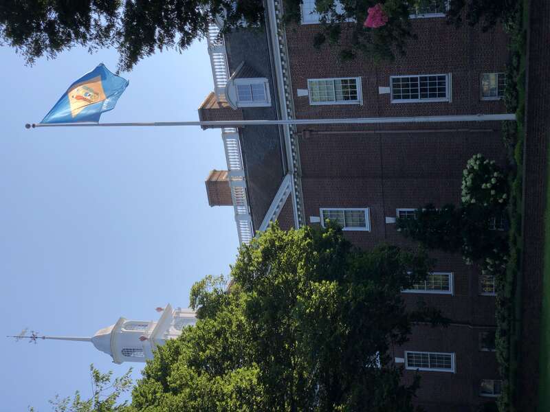 Delaware state flag flying on the southwest side of the Delaware Legislative Hall (Delaware Capitol Building) in Dover, Kent County, Delaware