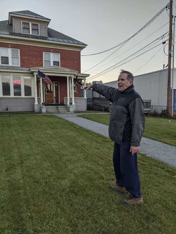 Brian Judd in front of American Legion Post 10 at 320 North Main Street (U.S. Route 302) in downtown Barre, Vermont.