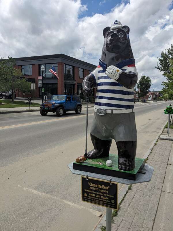 &quot;Chase the Bear&quot; sculpture by Roger King, Barre Art Splash, on Main Street in downtown Barre, Vermont. Organized by the Barre Rotary Club.
