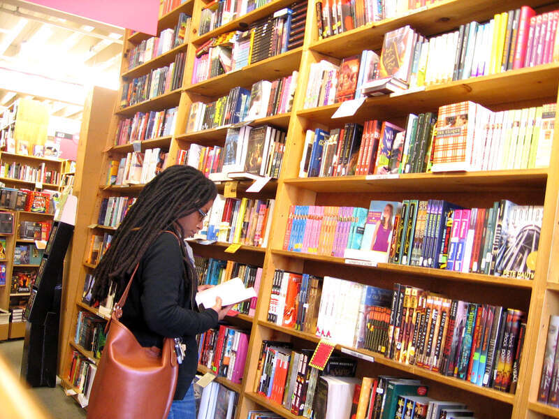 The book I am holding and eventually bought is &quot;The Amber Spyglass&quot; the last in the His Dark Materials trilogy.  I have checked it out from the library several times, but since I am a slow reader I have to return it before I get to the end.  I found