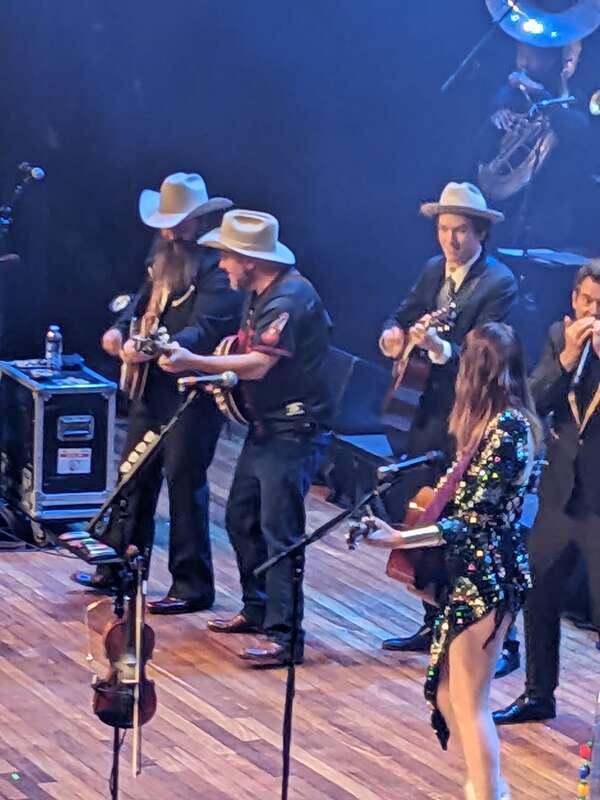 Molly Tuttle performs with Old Crow Medicine Show on New Year's Eve at Ryman Auditorium in downtown Nashville, Tennessee.