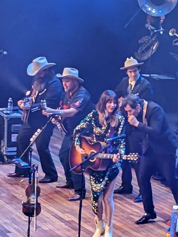 Molly Tuttle performs with Old Crow Medicine Show on New Year's Eve at Ryman Auditorium in downtown Nashville, Tennessee.