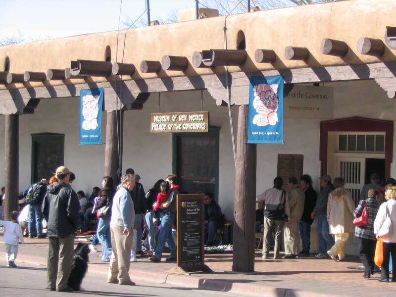 The Palace of the Governors (1610) is an adobe structure located on Palace Avenue on the Plaza of Santa Fe, New Mexico between Palace Avenue and Washington Street. It is within the Santa Fe Historic District and it served as the seat of government