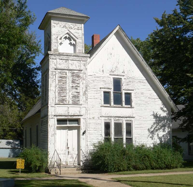 First Baptist Church, located at southeast corner of 5th Avenue and Seward Street in Red Cloud, Nebraska; seen from the northwest.  The 1884 church is listed in the National Register of Historic Places.