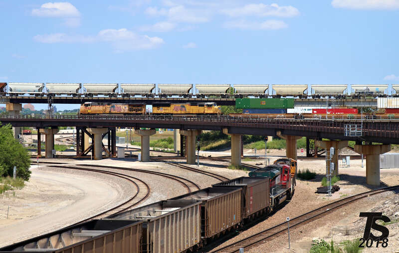 Burlington Northern Santa Fe 8831(SD70MAC), Ferromex 4029(SD70ACe), BNSF 6317(ES44AC) and 5767(ES44AC) Leading a Northbound Empty Coal Drag approaching Santa Fe Junction with a WB Union Pacific Intermodal and EB Burlington Northern Santa Fe Covered