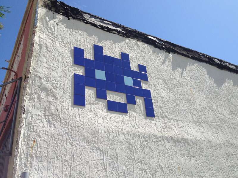 UPDATE: The building has been demolished but the Space Invader was saved.