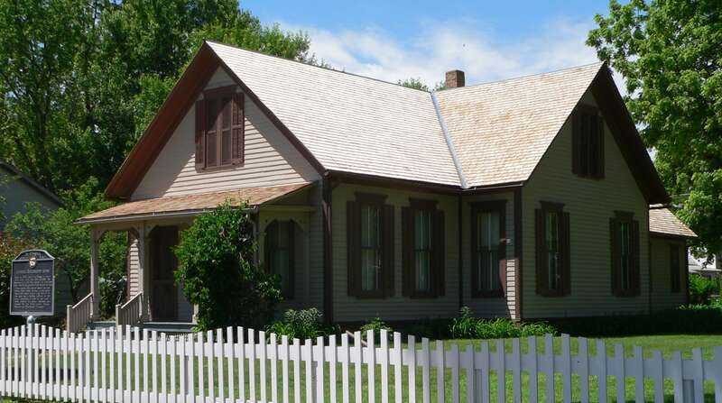 Willa Cather House on the southwest corner of 3rd Avenue and Cedar Street in Red Cloud, Nebraska; seen from the northeast.  Built ca. 1878, it was Cather's home from 1884 to 1890.  It is listed in the National Register of Historic Places.