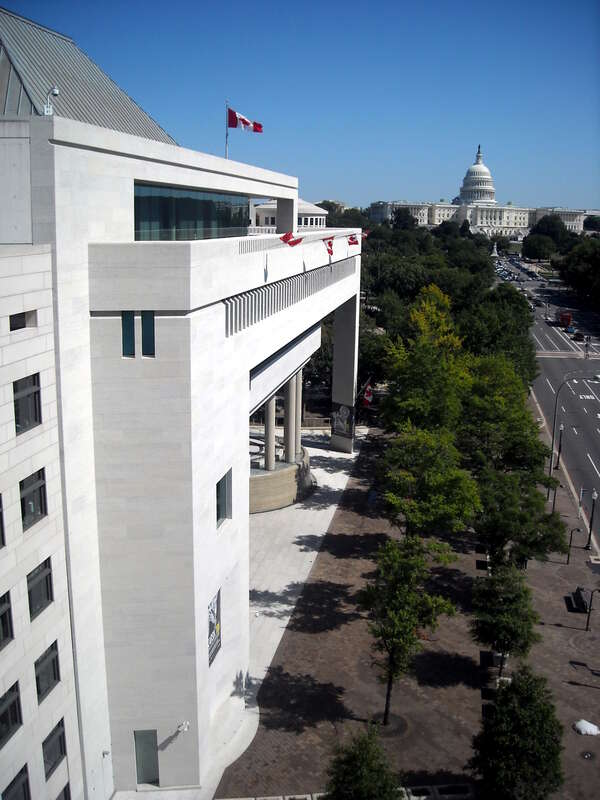 The Embassy of Canada and the United States Capitol, as viewed from the Newseum's Hank Greenspun Terrace, in Washington, D.C.