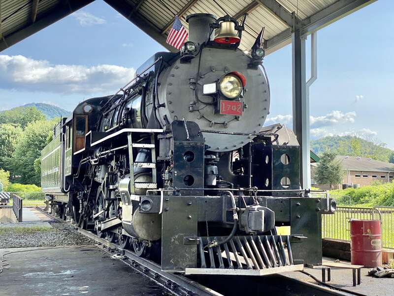 Great Smoky Mountains Railroad 1702 is an S160 class 2-8-0 &quot;Consolidation&quot; type steam locomotive built in September 1942 by the Baldwin Locomotive Works in Philadelphia, Pennsylvania, originally for the U.S. Army Transportation Corps during World War