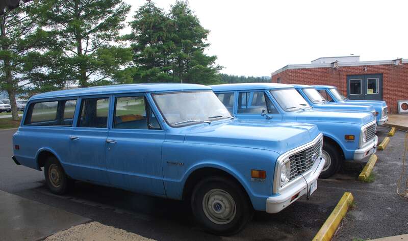 National Radio Astronomy Observatory in Green Bank, West Virginia uses a fleet of old (no computer) diesel (no spark-plugs) cars and trucks for the site maintenance to minimize radio pollution around the telescopes. Here four Chevy Suburbans C10 350