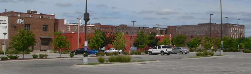 Downtown Omaha, Nebraska: view facing northeast from not far south of intersection of 14th and Izard Streets.  Most of the buildings in the photo are part of the Nicholas Street Historic District, listed in the National Register of Historic Places.