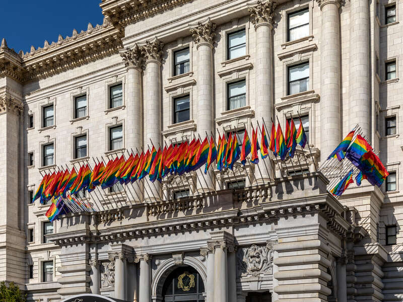 LGBTQ flagging at the Fairmont Hotel on Mason Street during California LGBTQ Pride Month (June 2022), San Francisco, California, USA