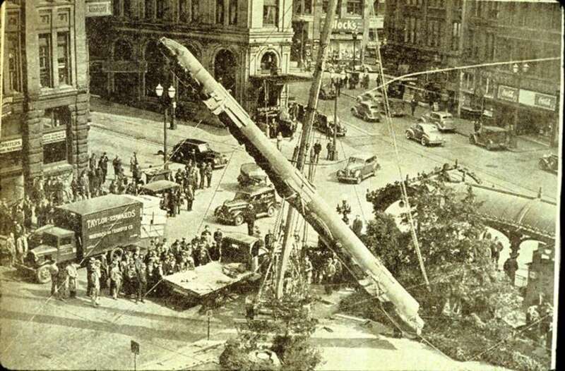 Reinstallation of Pioneer Square totem pole, Pioneer Square Park, Seattle, Washington, 1940