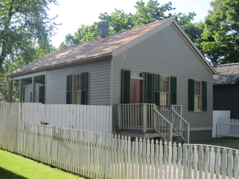The Sprigg House at the Lincoln Home National Historic Site (1851). Julia Sprigg, who became a friend of Mary Lincoln, bought the house in 1853. Tad Lincoln played with Sprigg's children. Sprigg's daugter was an occasional caretaker for the young