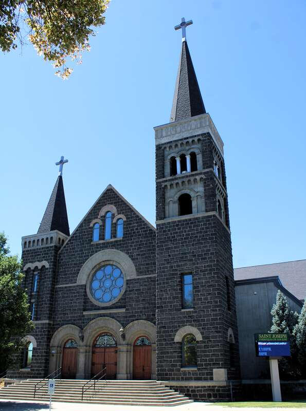 St. Joseph Catholic Church in Yakima, Washington. The church was completed in 1905. It was heavily damaged in a fire in 1999. All that remains of the 1905 church building is the facade and the towers. The rest of the church is new construction