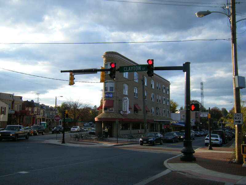 The intersection of Clayton Street (crossing) with Delaware Avenue (right) and 16th Street (left) in the Trolley Square neighborhood of Wilmington, Delaware.  The triangular building is home to a pizza place.