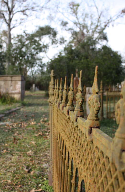 A gate with fleur-de-lis in the cemetary of Grace Episcopal Church in St. Francisville.