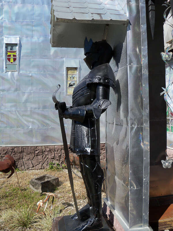 Solomon's Castle in Florida. 
&quot;Castle&quot; built from discarded materials and objects by an eccentric artist in swamps on Ona, Florida; walls are covered with used aluminum printing plates that reflect light.