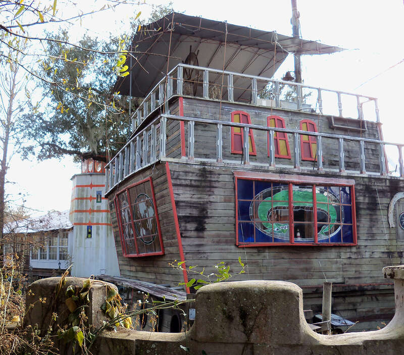 Solomon's Castle in Florida. 
&quot;Castle&quot; built from discarded materials and objects by an eccentric artist in swamps on Ona, Florida; walls are covered with used aluminum printing plates that reflect light.