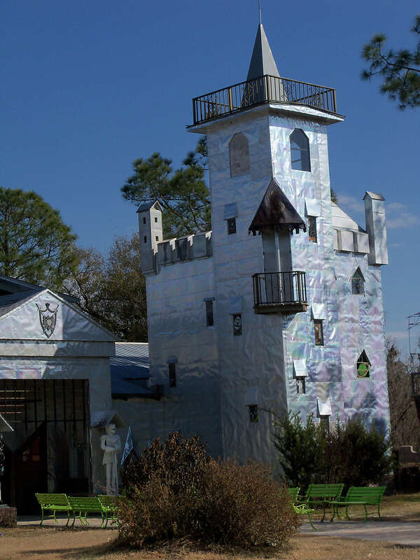 Solomon's Castle in Florida. 
&quot;Castle&quot; built from discarded materials and objects by an eccentric artist in swamps on Ona, Florida; walls are covered with used aluminum printing plates that reflect light.