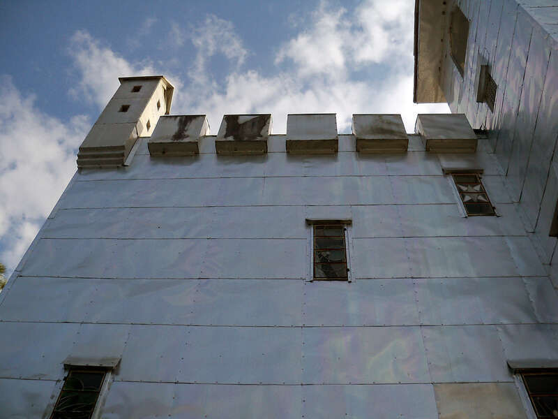 Solomon's Castle in Florida. 
&quot;Castle&quot; built from discarded materials and objects by an eccentric artist in swamps on Ona, Florida; walls are covered with used aluminum printing plates that reflect light.
