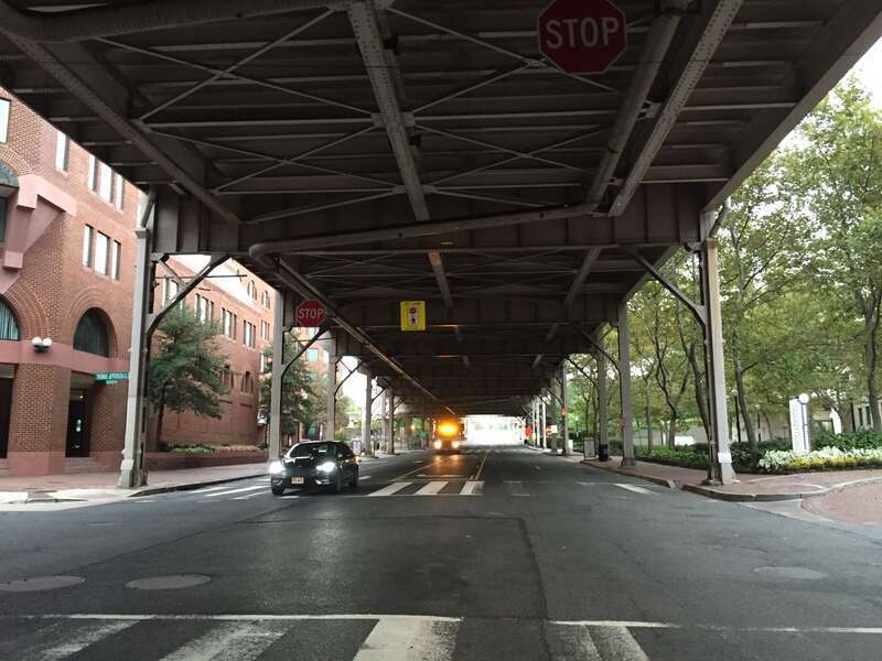 View east along K Street NW at Thomas Jefferson Street NW, directly underneath U.S. Route 29 (Whitehurst Freeway) in Washington, D.C.