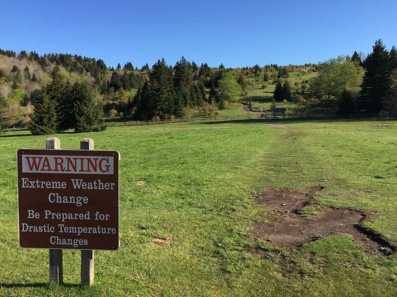 Sign warning of extreme weather along the Rhododendron Trail within Grayson Highlands State Park in Grayson County, Virginia