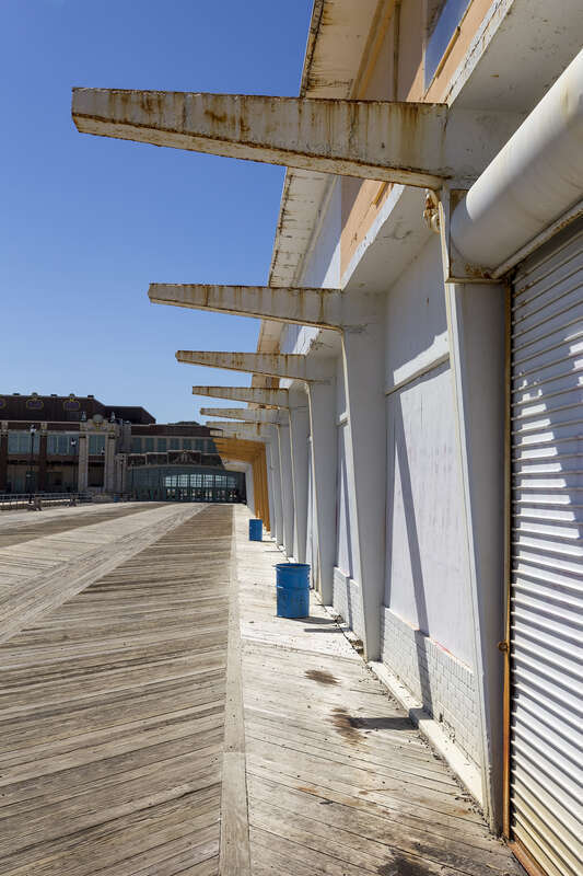 Boarded-up shops on the boardwalk at Asbury Park, New Jersey, USA