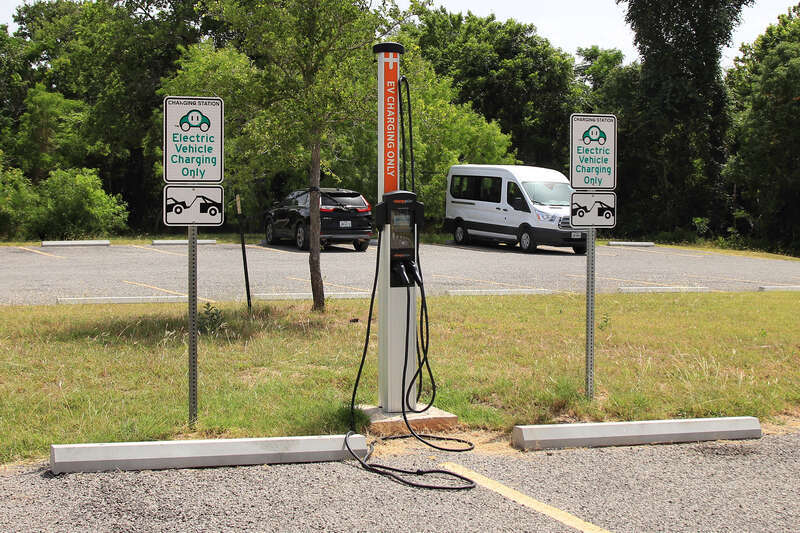 An electric vehicle charging station in McKinney Falls State Park in Austin, Texas, United States.
