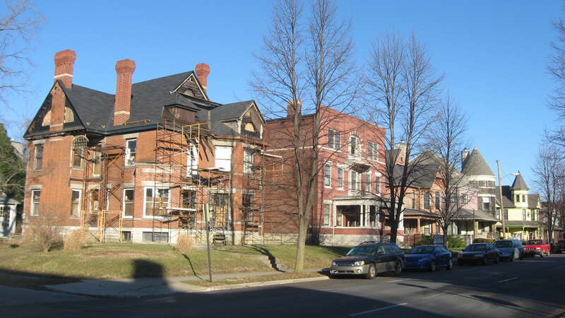 Buildings on the northern side of the 700 block of W. Main Street (State Road 32) in Muncie, Indiana, United States.  The house on the left edge of the picture was built in 1890, as were many other houses in the area.  This block is part of the Emily