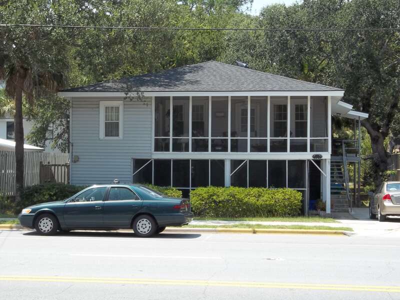 Tybee Island, Georgia: House at 1207 Butler Street on west side of Butler St. near to, but NOT included in, the Tybee Island Strand Cottages Historic District.  The district includes properties across Butler St east to the Atlantic Ocean.